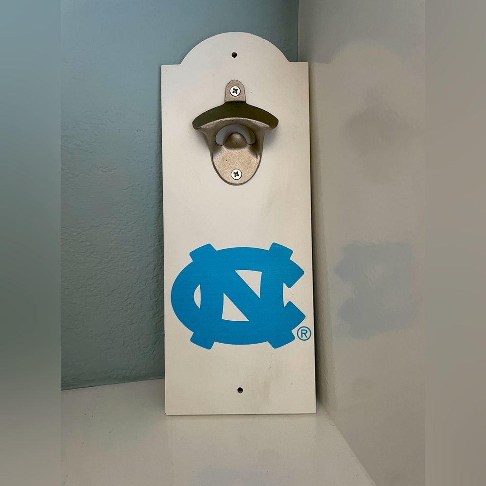 University of North Carolina
UNC Wall-Mounted Bottle Opener – Wood Plaque